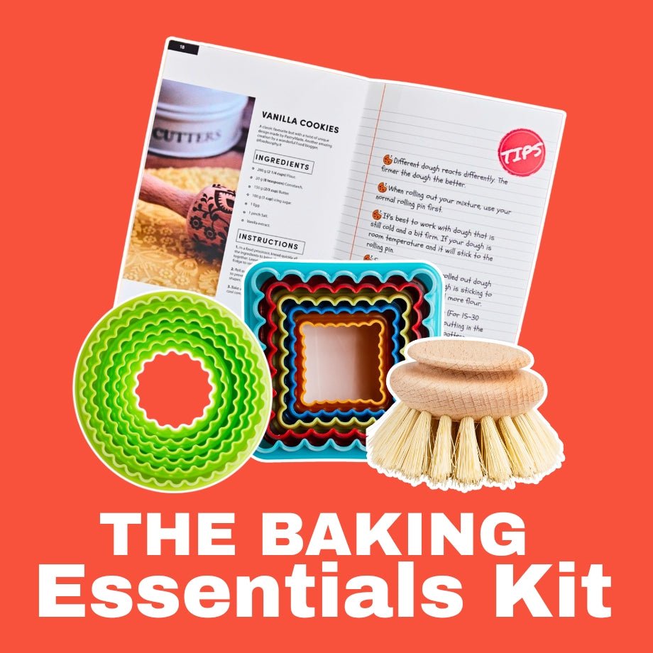 Baking Essentials Kit: embossed rolling pin, cookie cutters and cleaning brush together
